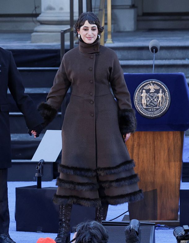 Rama Duwaji at New York City Hall, 1 January 2026. Vintage Balenciaga coat from the Albright Fashion Library; ceremony coat reworked by Cynthia Merhej of Renaissance Renaissance. Styled by Gabriella Karefa-Johnson. © APA-Images / REUTERS / Jeenah Moon