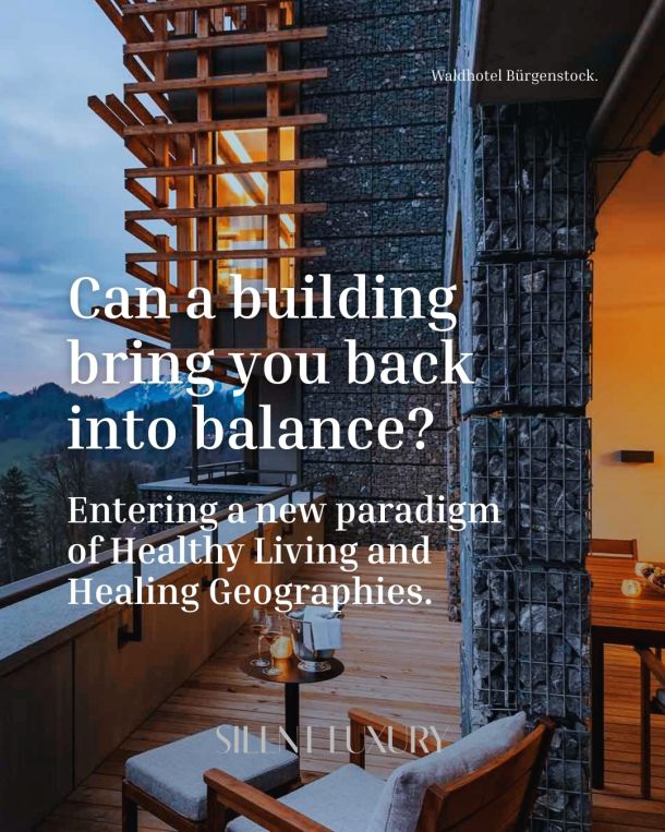 Exterior view of the wooden terrace at Waldhotel Bürgenstock in the snow, featuring the infinity pool. Architecture embodying Silent Luxury, integrating regenerative materials within the landscape of Obbürgen, Switzerland.