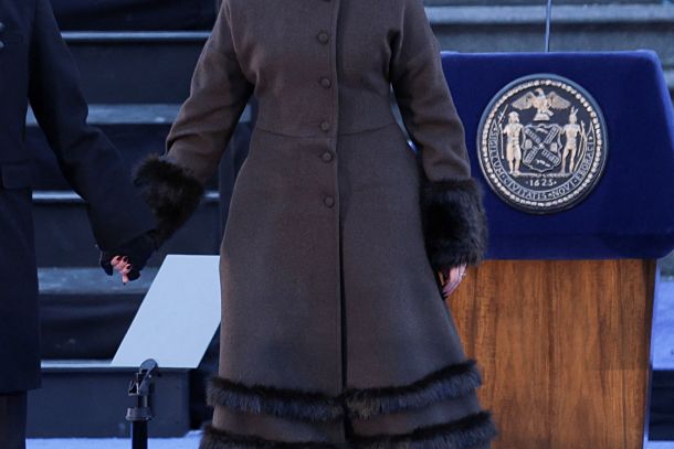 Rama Duwaji at New York City Hall, 1 January 2026. Vintage Balenciaga coat from the Albright Fashion Library; ceremony coat reworked by Cynthia Merhej of Renaissance Renaissance. Styled by Gabriella Karefa-Johnson. © APA-Images / REUTERS / Jeenah Moon