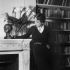 Elsa Schiaparelli at home, among books and arum lilies, 1936. Photograph by Boris Lipnitzki. Credit: APA-Images / Roger Viollet / Boris Lipnitzki.