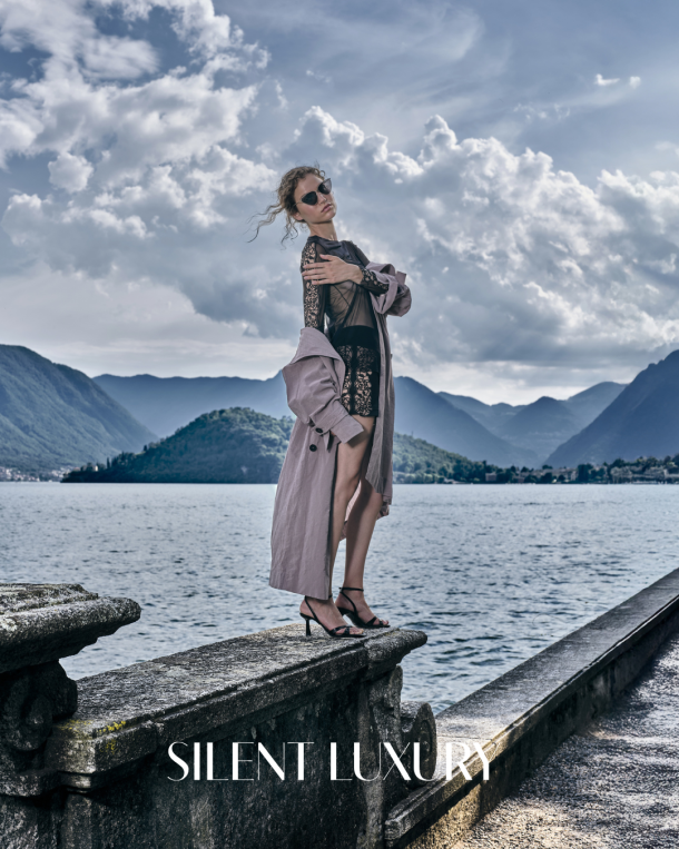 Model wearing a sheer Filifolli look from the Lake Como Collection by the lake