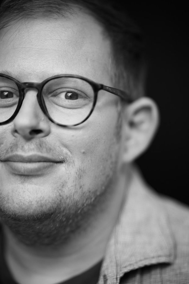 Markus Hufnagl, the creative mastermind behind Dulcesserie, in a focused black-and-white portrait representing radical and artistic patisserie.