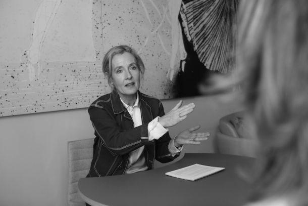 Petra Öberg Gustafsson, CEO of Fristads, at the Hotel Altstadt in Vienna. Her outfit is a visual statement of the authenticity in her leadership: She is wearing a jacket and trousers from the Limited Edition 100 Years Collection. This garment honors Fristads’ founding in 1925, using the brand’s original, durable FAS® fabric and a classic design—a tangible link between the company's past necessity for endurance and its future cultural mindset. I Photo: Michael Dürry.