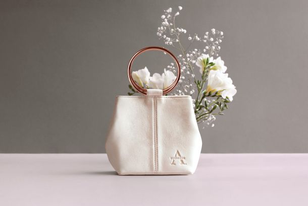 The Antarctic Summer: A white leather bag by Alexandra Svendsen, designed to outlast the wedding dress and accompany every chapter that follows. | Photo: Aleexandra Svendsen