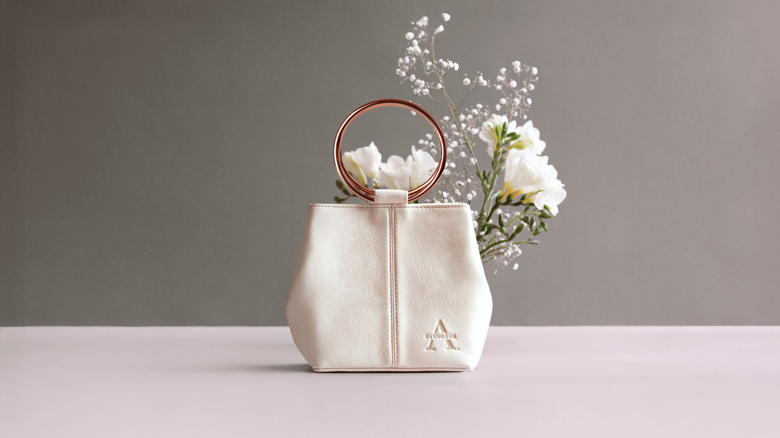 The Antarctic Summer: A white leather bag by Alexandra Svendsen, designed to outlast the wedding dress and accompany every chapter that follows. | Photo: Aleexandra Svendsen