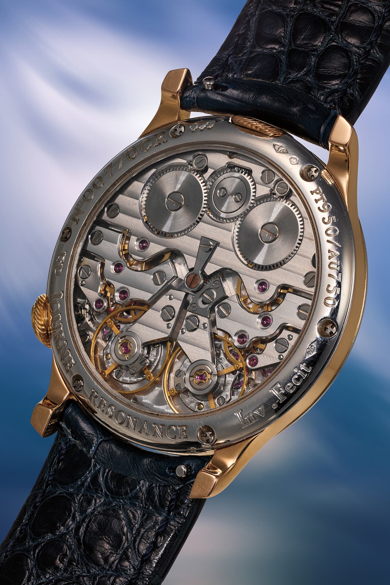 Caseback of the F.P. Journe Souscription No. 007, open movement engraved N 007/00R and PT950/AU750, twin balances and going trains