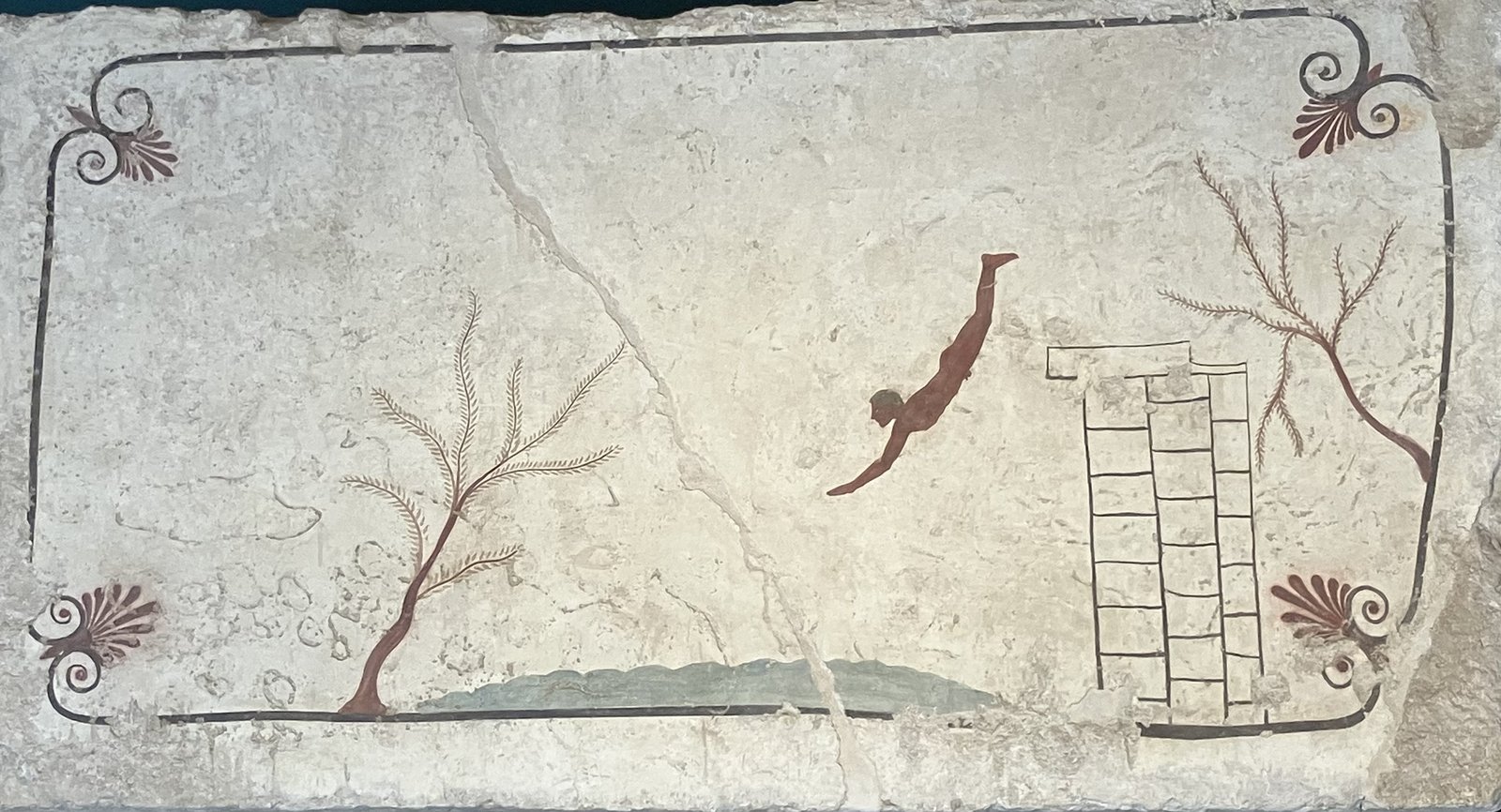 The fresco of the Tomb of the Diver at Paestum, a young man diving into water, painted around 480 BC.