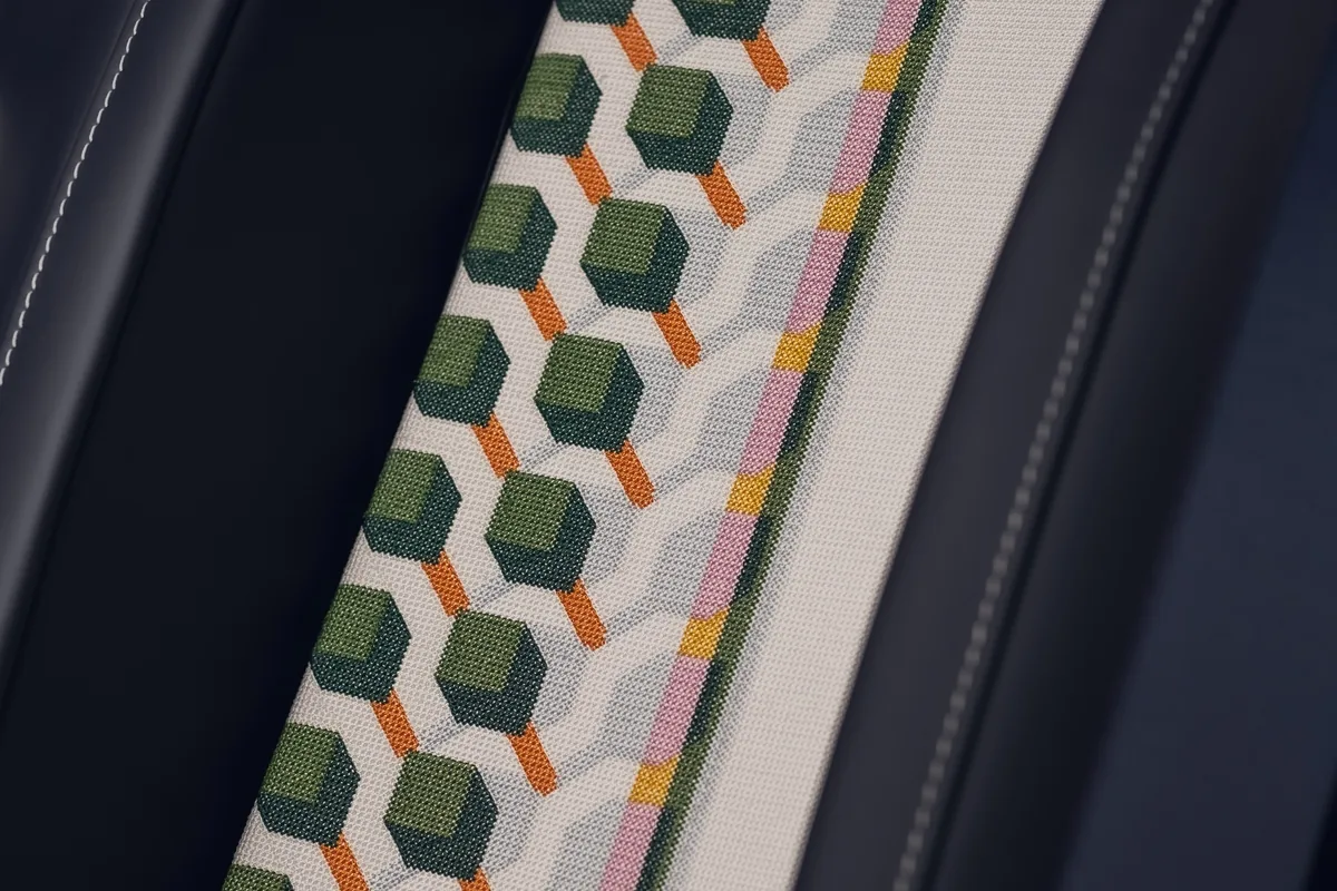 Hidden embroidery on the rear seat centre filler panel of the Rolls-Royce Ghost Savile Row