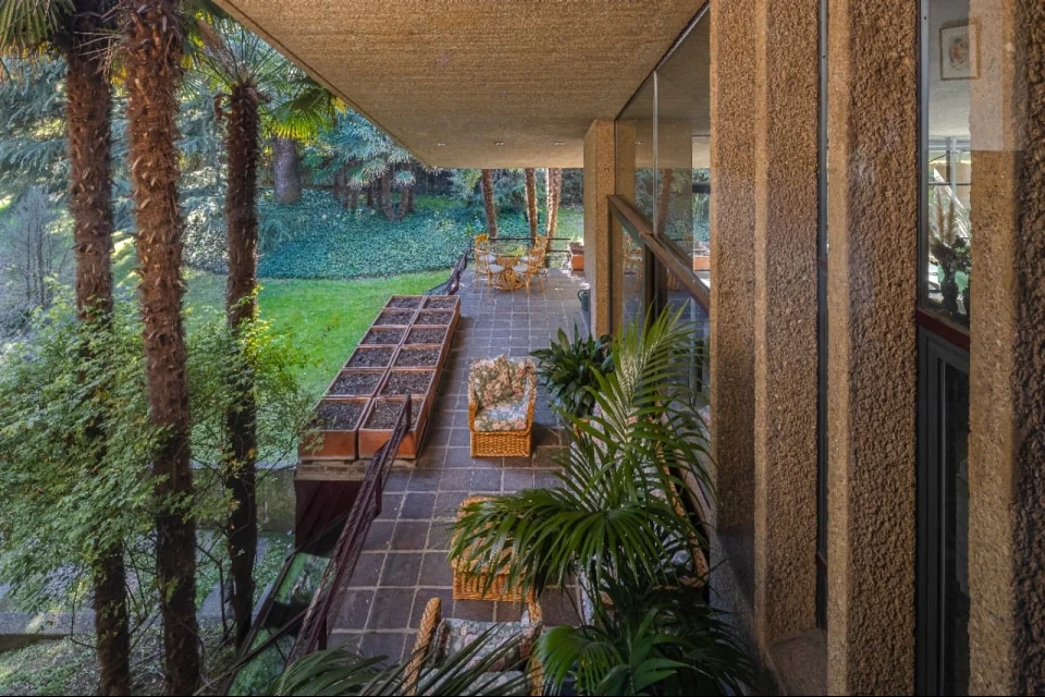 The terraces step down into the planted garden, so that the outdoor rooms read as a garden made of concrete | Photo: Courtesy of Italy Sotheby’s International Realty