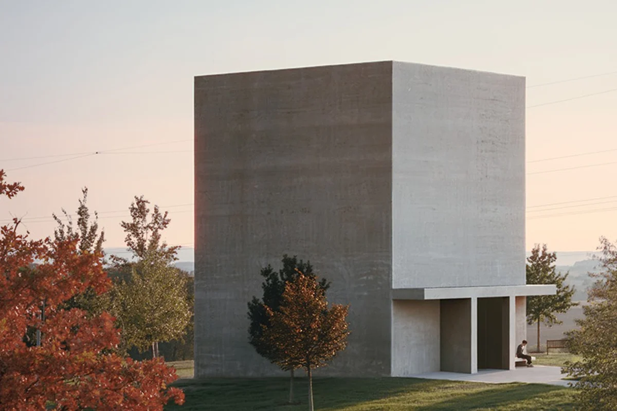 The concrete Anselm Kiefer Pavilion by David Chipperfield Architects at Museum Würth 2 in Künzelsau, Germany, at dusk.