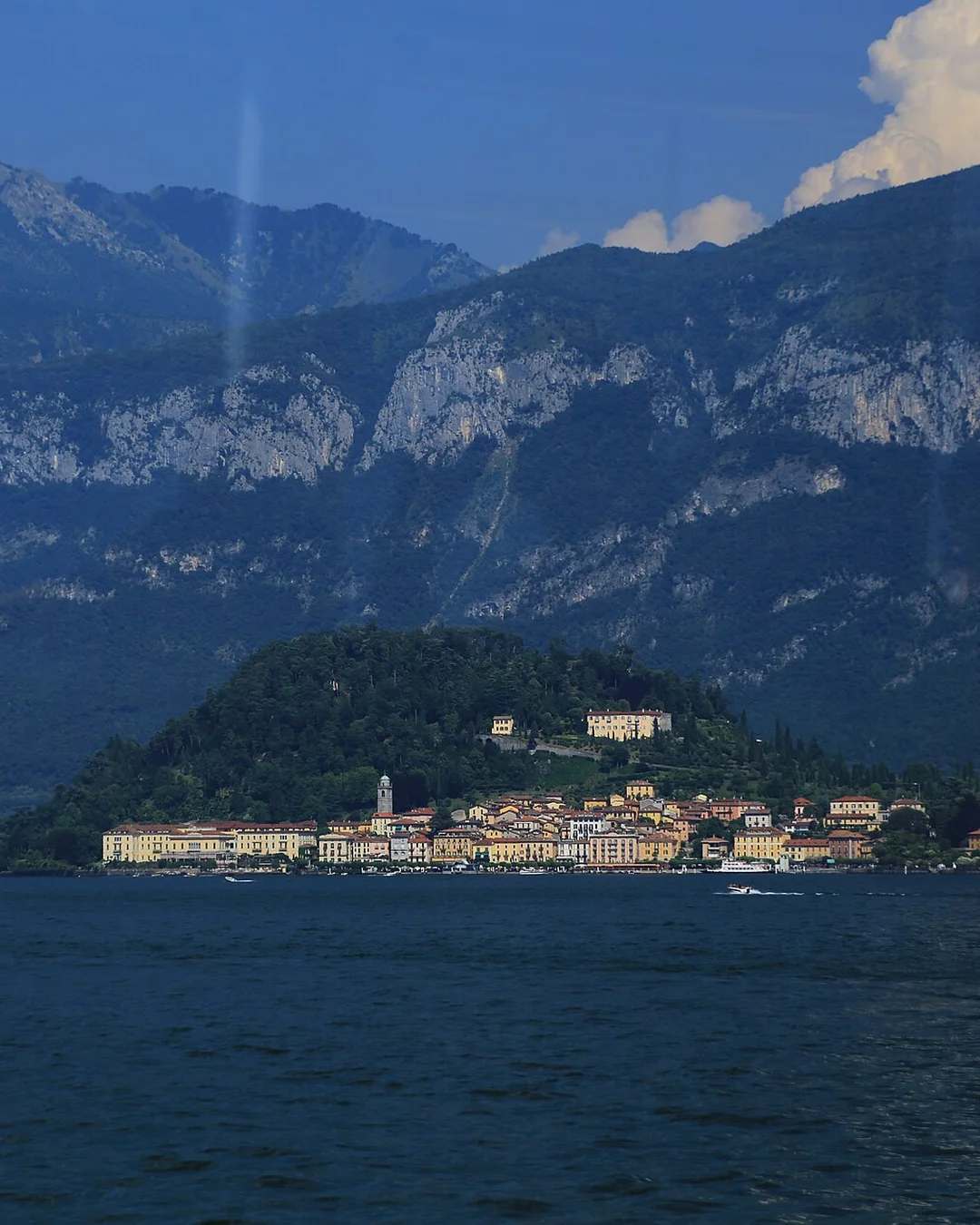 Bellagio on Lake Como seen from the water, with the mountains behind