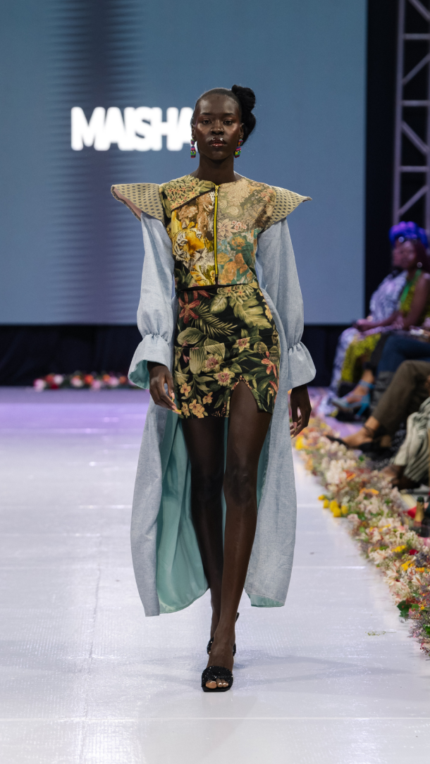Maisha by Nisria's ASILI collection: a Gilgil social-enterprise studio walking salvaged textile as primary couture material on the eighth season's runway.