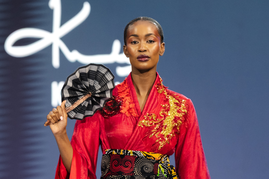 John Kaveke walks the eighth season at Sarit Expo Centre, where Japanese tailoring meets Samburu cultural reference under Brian Kihindas's editorial title Decarbonize. — Photography: Jenkins Kuyoh