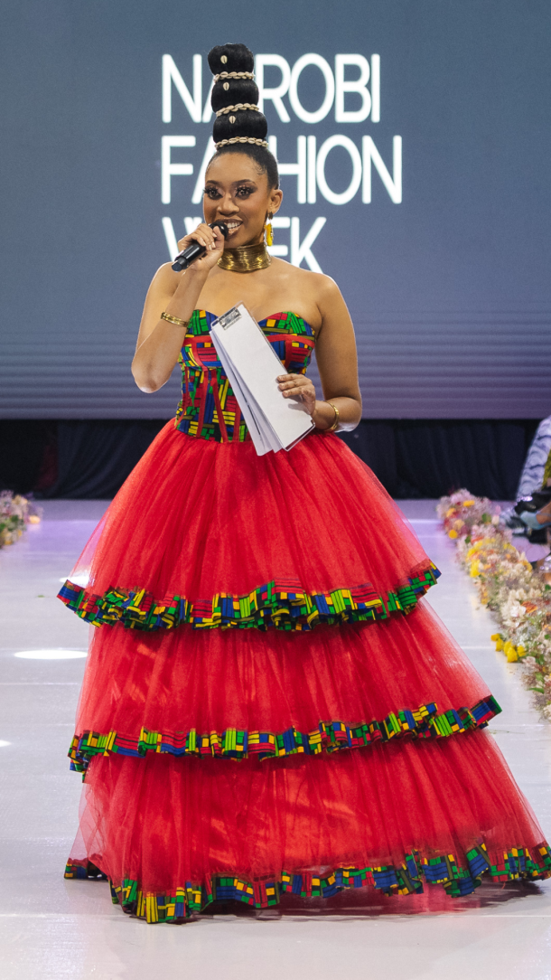Angela Wambui Muiruri, known as KQ - the Kenyan Queen - carrying the eighth edition of Nairobi Fashion Week as Master of Ceremonies, Sarit Expo Centre, January 2026.