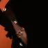 Stacked Fullord bracelets on a wrist in silhouette. Courtesy of Fullord Geneva